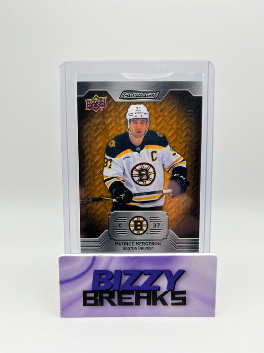 *SINGLES* PATRICE BERGERON ENGRAINED OAK BASE 210/299 BOSTON BRUINS